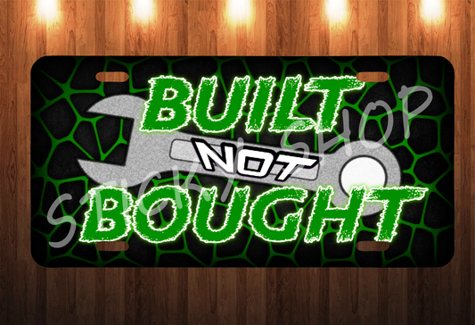 Built not bough License Plate